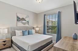 Chic 2BR Condo w Balcony Near Epic Universe - Image 5
