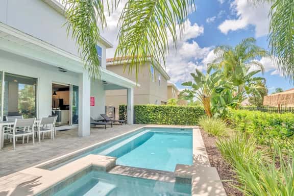 Pool Home! 5BR w Patio & Free Parking near Disney - Image 1