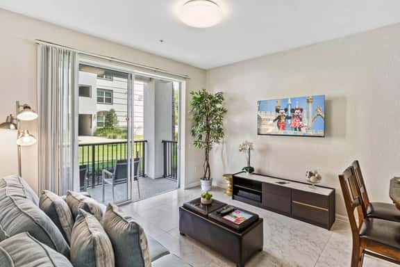 Resort Access 2BR Condo w Patio near OCCC & Disney - Image 1