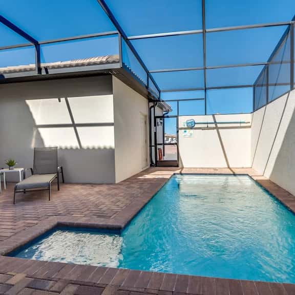 Charming 4-BR Lake Access Townhouse with Pool Fun - Image 1