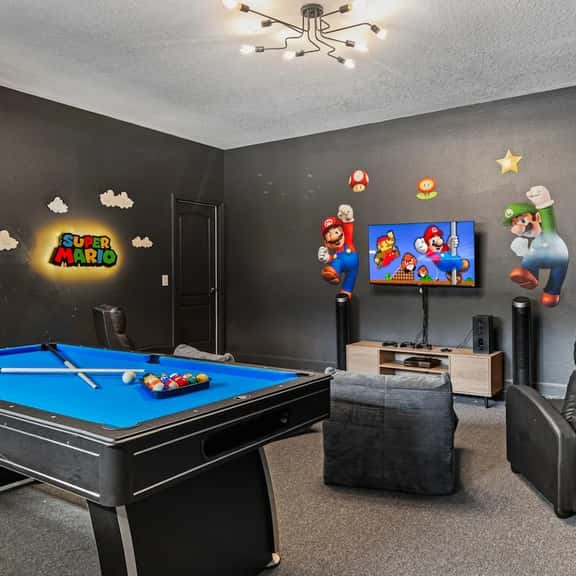 Renovated 9BR Oasis w Pool + Game Room Near Disney - Image 1